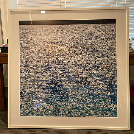 Untitled archival pigment print in white frame white matte 49" x 49"